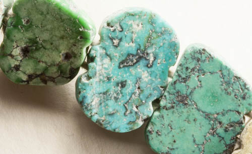 back of turquoise bat beads from China